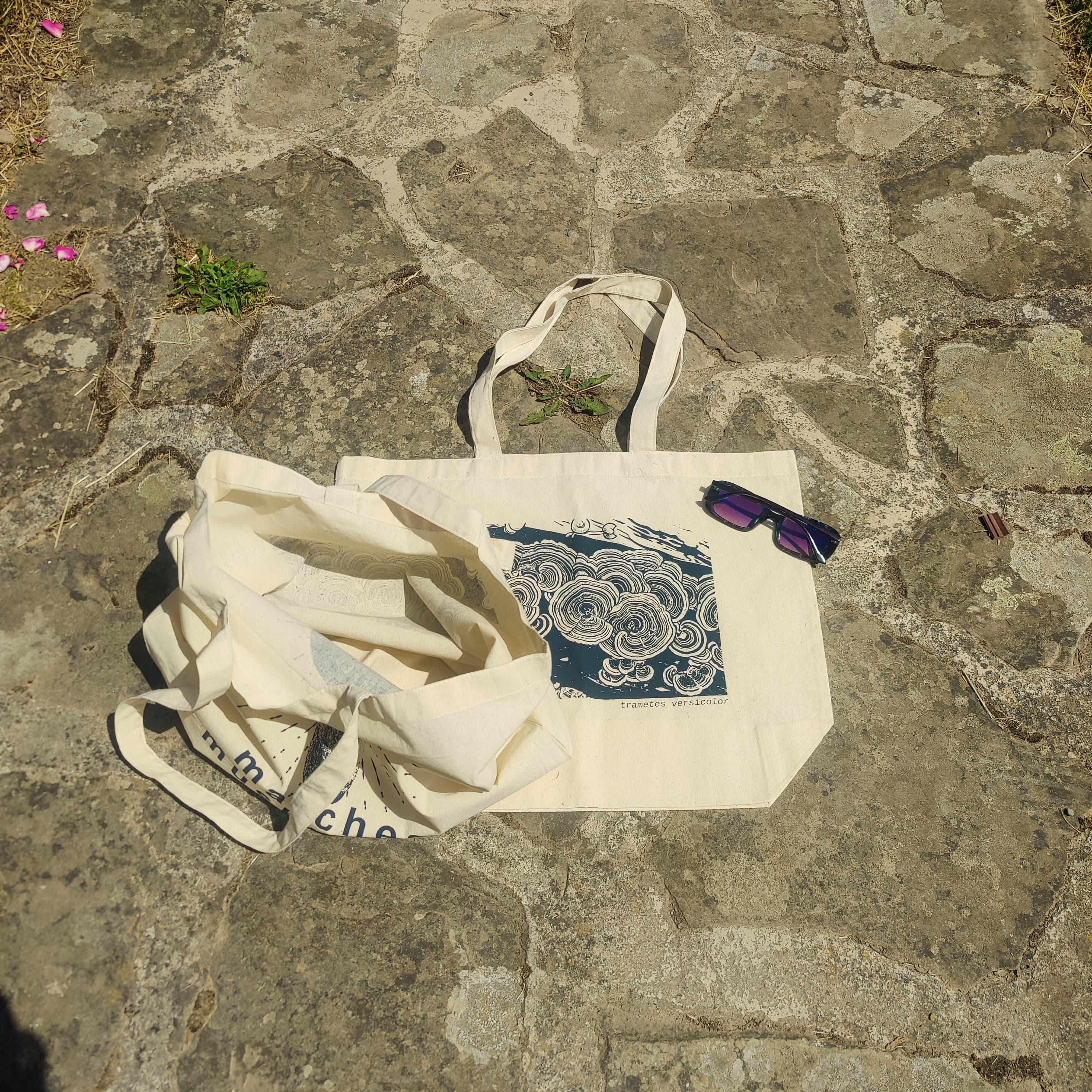 our hot off-the-press tote bags available exclusively at our market stalls